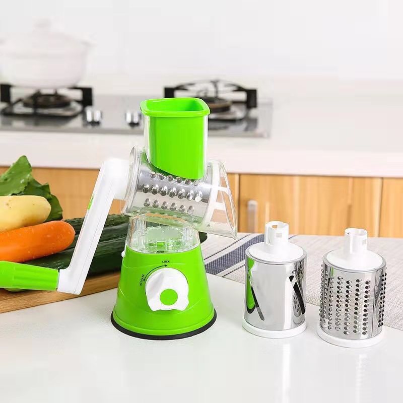 Vegetable slicer slicing vegetables into bowl