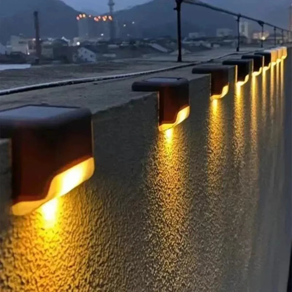 Solar deck light glowing at night